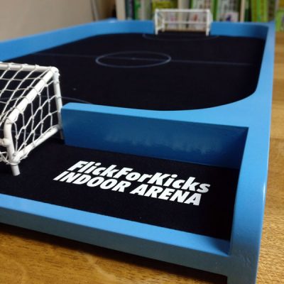 Photo of a FlickForKicks Light Blue Indoor Arena with a black pitch- Non-standard Paint colour