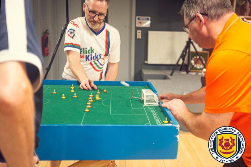 Gareth Christie of FlickForKicks scores a lob in a game of Subbuteo against Steve Bennett in a Scottish Subbuteo Association circuit match